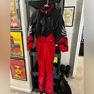 Bogner Black and Red One Piece Ski Suit with Multicolor Detail